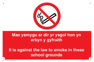 Mae ysmygu ar dir yr ysgol hon yn erbyn y gyfraith It is against the law to smoke in these school grounds - Bilingual Welsh / English